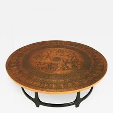 It can be used as a coffee table, round sofa table, end table, cocktail table, office table, etc. Round Copper Leaf Relief And Ebonized Walnut Coffee Table