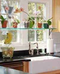Mounted shelves wood shelves kitchen window shelves bathroom shelves diy shelving floating glass shelves desk shelves bathroom wall quarter removable window shelf for plants. Stationary Window Designs 20 Window Decorating Ideas With Glass Shelves Kitchen Sink Window Kitchen Window Shelves Clutter Free Kitchen Countertops
