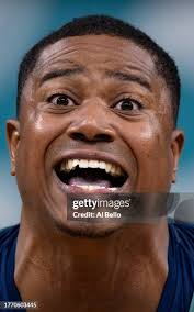 Gold medalist David Curtiss of Team United poses