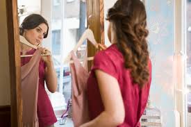 Fold the fabric under and pin it in place. How To Pin A Dress To Fit Tighter