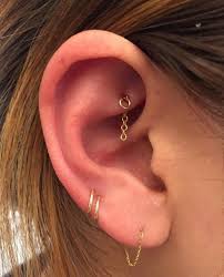 15 Reasons Why A Rook Piercing Should Be Your Next Choice Earings Piercings Ear Jewelry Different Ear Piercings
