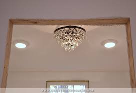 Vaulted ceilings can create a striking look in any room, making spaces feel larger and more open. Pantry Lighting Plus Adapting A Flush Mount Light For A Slanted Ceiling Addicted 2 Decorating