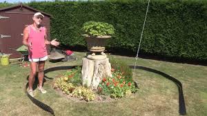 If the edge will be curved, make sure you include the curves when laying out your reference lines. How To Install Smartedge Cleveredge Lawn Edging Youtube