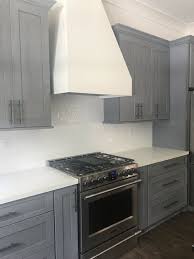 In the before photo, we can see this homeowner wanted to improve the cabinets' look and replace warped/separating doors. Yes Or No Pickled Cabinets
