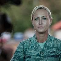 Latvian army jumpmaster 1st Sgt. Liene Katarina waits
