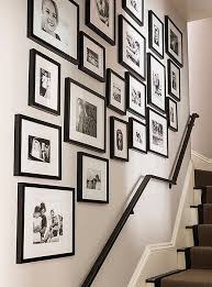 Black and white photos can deliver a strong image that would otherwise look weak and average in color. Inside A Rising Designer S Sophisticated Family Brownstone Family Photo Wall Frames On Wall Stairway Gallery Wall