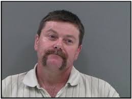 Man charged for explosive device at elderly mother'...