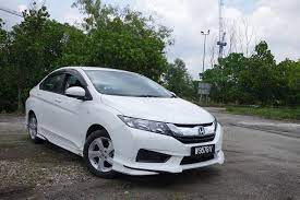 **i drive with a light. Honda City S One Part Sporty Three Parts Practical