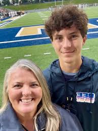 Made some new friends at the game tonight! Thank you for working together  to deliver an excellent game day experience under the lights!  #akronathletics #akronbands #zips