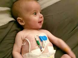 Parents who spent 5 years trying to conceive devastated when newborn  diagnosed with cancer