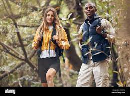 Interracial couple hiking hi-res stock photography and images - Alamy