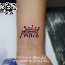 Simone requested a maori styled design with two crowns, each one with a banner below where a name can be written. Crown With Prince Name Tattoo By Ashokkumarkashyap On Deviantart