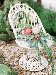 Set up appointments with wedding florists in the area to discuss options. The Flower Social