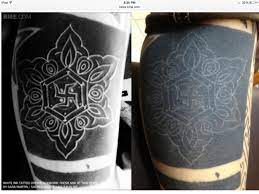 Sara Martin Tattoo Artist Sacred Images Bozeman Mt Started As Red Tattoo Covered By Black Then White Tattoos Black Cover Up Tattoo Cover Up Tattoo Design