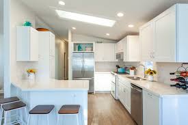 Underneath the island, we also installed kraftmaid maple cabinets, in the shade of maple midnight, with an onyx glaze. Kraftmaid Residential Kitchen California Woodworking