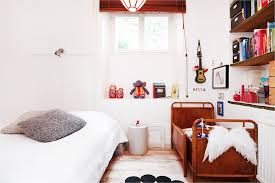 Whether you choose to frame baby portraits or fun prints of fairy tales, a photo wall adds a distinctive style to your child's bedroom. Sharing Bedroom With Baby Decor Ideas And Inspiration