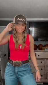 Country Girl Dancing with Spine Tattoo