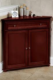 Pin By Caryn On Mes Enregistrements Corner Storage Cabinet Living Room Cabinets White Storage Cabinets
