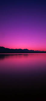 خلفيات ايفون انعكاس شفق الغروب فوق مياه البحيرة الهادئة landscape photography nature night sky wallpaper landscape photography