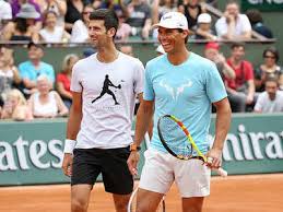 Novak djokovic and rafael nadal pose with their trophies after the french open final. French Open History Beckons Rafael Nadal Novak Djokovic Tennis News Times Of India