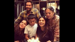 Sharing different but adorable and cute expressions in a red saree with a white border, the actress. Working Towards A Green Tomorrow Ajay Devgn And Kajol Wish Son Yug On 10th Birthday