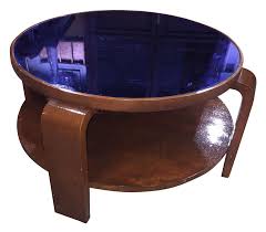 Vintage art deco blue mirror glass coffee table square shape 8 sides bloomagainvintage 5 out of 5 stars (72) $ 349.00. Captivating Round Mid Century Modern Table Featuring A Vivid Cobalt Blue Glass Top 15 1 4 H X 26 1 2 To Top X 30 1 Art Deco Lamps Art Deco Decor Deco Decor