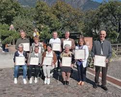 11 Maestres del Comerz de Fascia - La Usc di Ladins - Plata dla Union  Generela di Ladins dla Dolomites - 18.02.2024