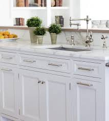 Crisp White Kitchen Cabinets With Marble Countertops And Polished Nickel Hardware Kitchen Cabinets Kitchen Cabinets Makeover Kitchen Cabinetry