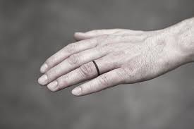 Tiny Ring Tattoo Small And Thin Black Line Ring Tattoo On Left Arm S Ring Finger Tattoo Wedding Rings Wedding Ring Tattoo Wedding Ring Tattoo For Men
