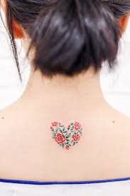Heart made out of flowers tattoo. 20 Mesmerizing And Unique Heart Tattoos To Express Yourself