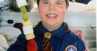 Scouts roast kabobs in the desert