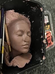 A face pressed up against glass. Very artistic now.