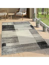 Mit klassischer eleganz und fairer produktion schmeichelt unser teppich kolvra augen und gewissen gleichermaßen. Paco Home Designer Teppich Kurzflor Wohnzimmer Meliert Karo Muster In Grau Schwarz Weiss Klingel