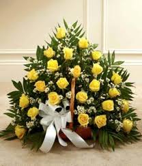 Ferns n petals offers online a varied range of sympathy. Yellow White Rose Fireside Basket At From You Flowers