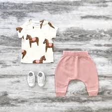 Cool Baby Clothes Mini Rodini Organic Horses Tee Rock Your Baby Track Pants Converse Baby Chucks Www Ti Cool Baby Clothes Baby Clothes Online Baby Clothes