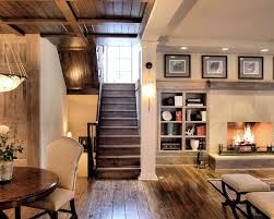The exposed wood beams on this basement ceiling are a rustic but contemporary architectural feature. Rustic Design Pictures Remodel Decor And Ideas Page 8 Basement Design Rustic Basement Basement Remodeling