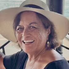 Slide 1: A solo photo at the gates of the palace. Slide 2: The team and I  with the Crown Prince of Tonga, Tupouto'a 'Ulukalala, and his gracious  wife, Sinaitakala Fakafanua. Slide