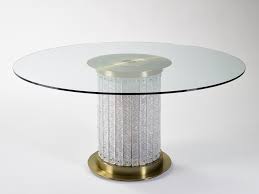 As far as glass dining tables go, round glass dining tables with beveled edges seem to be the most popular choice among most people. Round Glass Dining Tables That Make A Stylish Impression