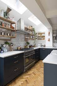 To go contemporary, pair your white cabinets with black hardware. Real Home An Open Plan Kitchen Extension With Industrial Touches Interior Design Kitchen Small Home Decor Kitchen Kitchen Design