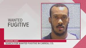 Police: Wanted fugitive hits officer with car following traffic stop