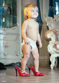 Little Girl Walking In Red High Heels Shoes Stock Photo Download Image Now Istock