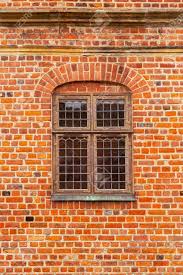 Find glass replacement near me. Brick Wall Of Old Castle With Window Glass Panel Window In A Stock Photo Picture And Royalty Free Image Image 125481683