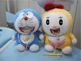 The Cute Yet Creepy Dental Doraemon Plush Doraemon Creepy Stuffed Animals Cute Stuffed Animals