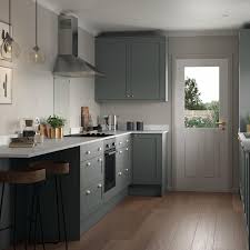 Shaker cologne design in light grey finish. Grey Shaker Kitchens Fitted Kitchens Kitchens Howdens