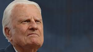 Admirers salute Billy Graham as motorcade crosses North Carolina