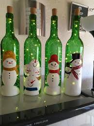 Learn How To Make Cheap And Easy Diy Christmas Decorating Ideas On A Budget Led Lights In A In 2020 Wine Bottle Crafts Christmas Holiday Wine Bottles Wine Bottle Diy