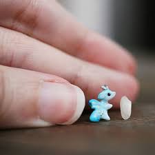 And Here He Is About A Grain Of Rice And A Half The Weather Was A Bit Better Today Still Very Cloudy Though Cute Polymer Clay Cute Clay Polymer Clay Figures