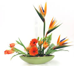 Bird Of Paradise Silk Flower Arrangement Monochromatic Orange Floral Arrangement With Birds Of Paradise Pincushion Protea Gerbera Daisies Lilies And Unique Flowers Floral Arrangements Gerbera Daisy