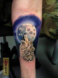 Moon and wolf tattoo on right back shoulder. Fantastic Work In This Wolf Tattoo By Soydan At Yakuzatattoo In Waterford Ireland Wolf And Moon Tattoo Moon Tattoo Wolf Paw Tattoos