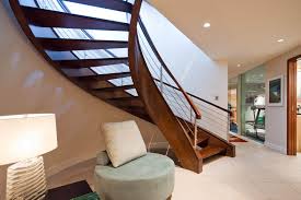 Detailed woodwork on the staircase railing gives added visual interest. Modern Staircase Design Contemporary Stair Design Ideas